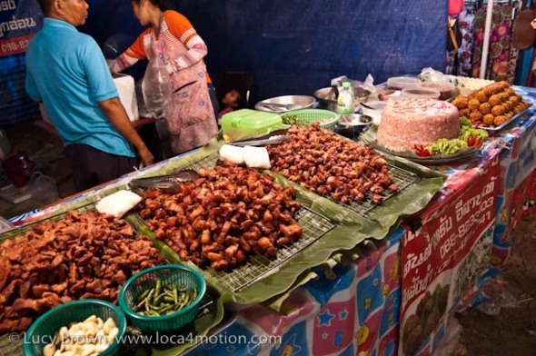 Fried meats, sticky rice and pork cake, street food, Thailand